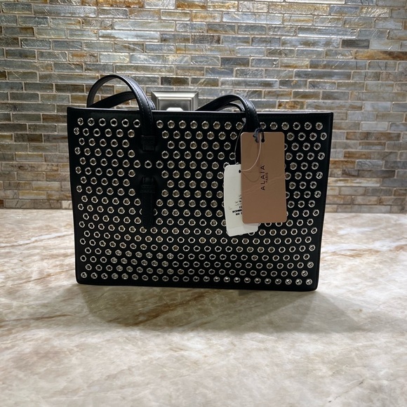 ALAÏA Mina Small perforated leather tote bag - Picture 6 of 14